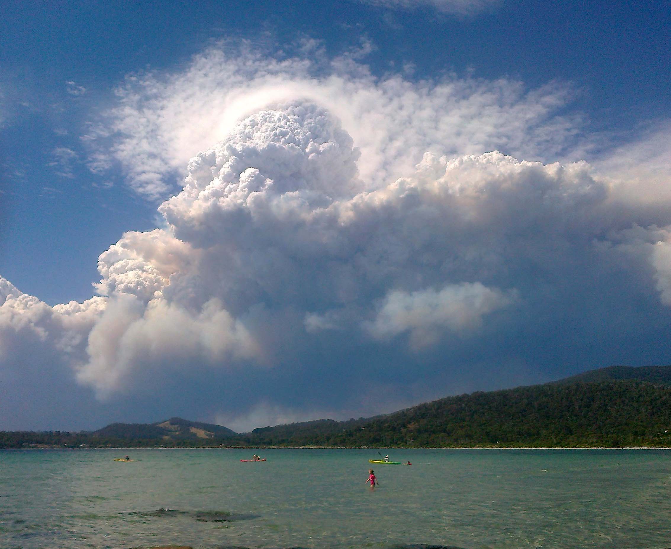 Image: Pyrocumulonimbus cloud forms above a bushfire in Tasmania, 2013. Credit: Janice James