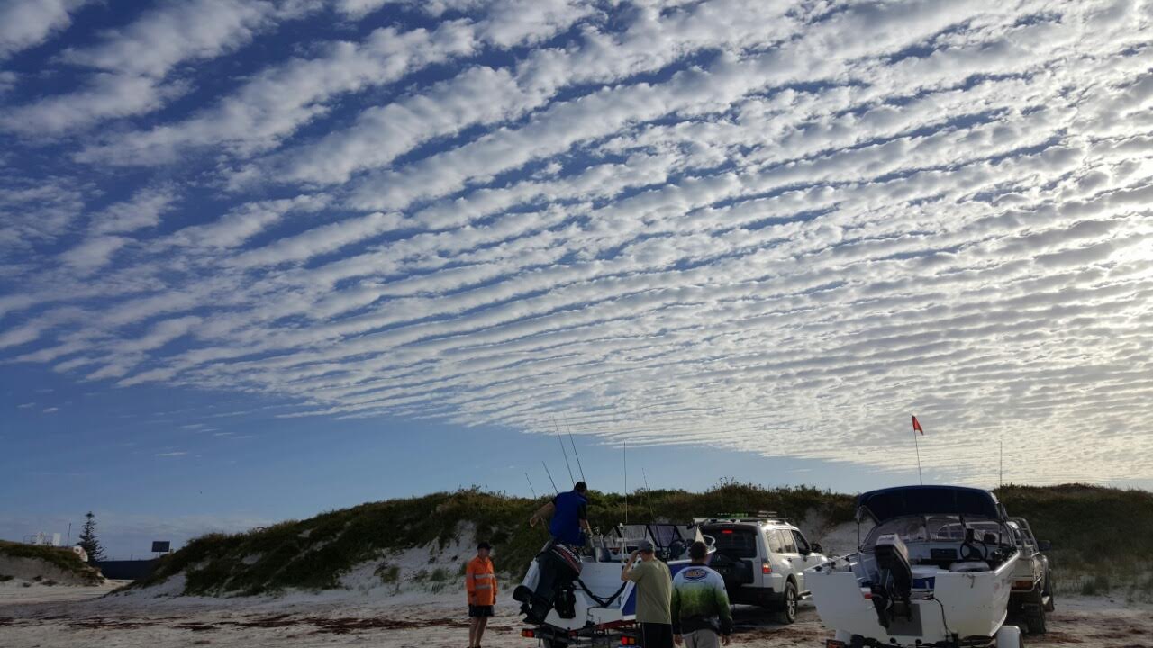 Sky full of clouds arranged in stripes