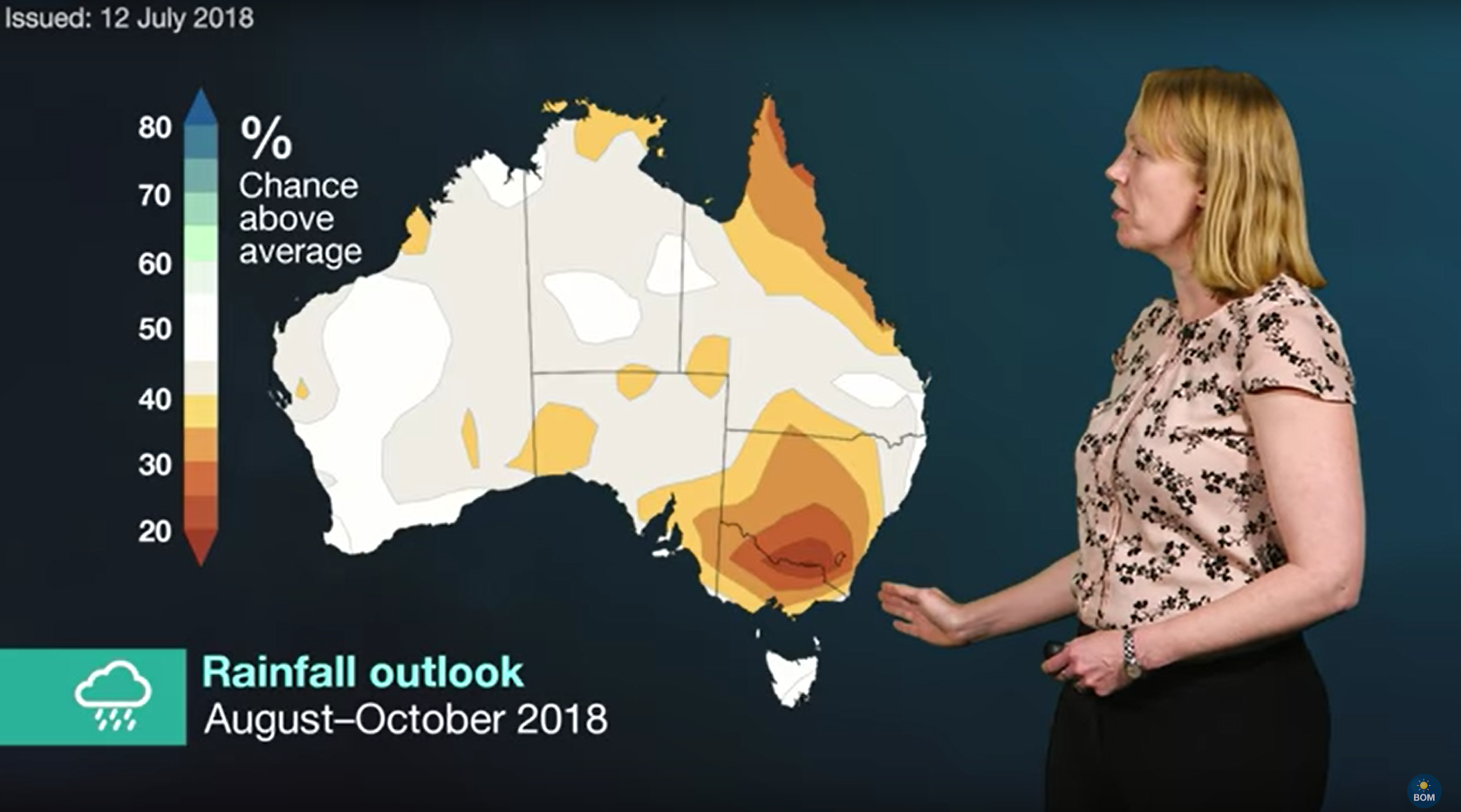 Still from Climate Outlooks video showing presenter in front of a map showing chance of above average rainfall