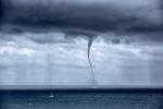 What are waterspouts, and how do they form?